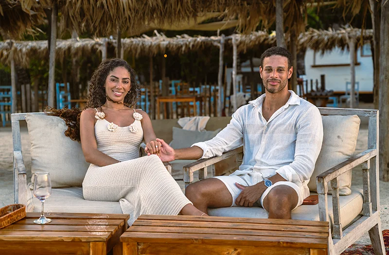 A couple having a sunset time in a private beachclub in Tierra Bomba